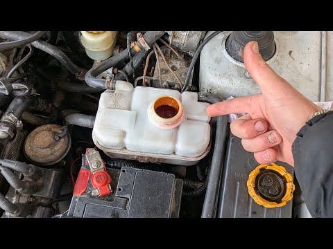 Видео: ‼️Давит антифриз в расширительный бачок‼️Поднялся уровень масла.#cars #automobile 