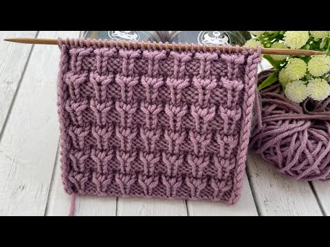 Видео: Объемный рельефный узор спицами для шапок или свитеров.