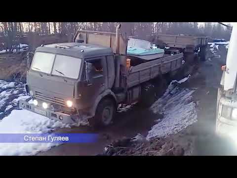 Видео: Зимник  Грузовики по тяжелому бездорожью крайнего севера!