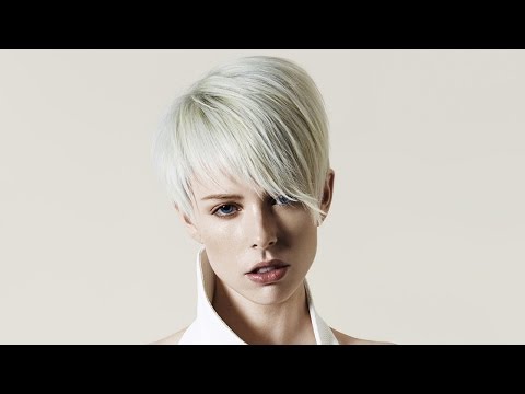 Видео: Женская градуированная стрижка на короткие волосы