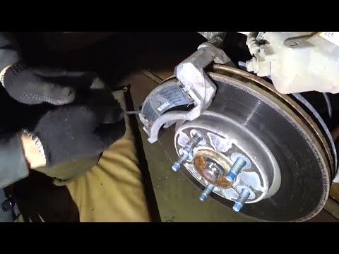 Видео: Замена тормозных колодок Chevrolet Equinox электрический ручник