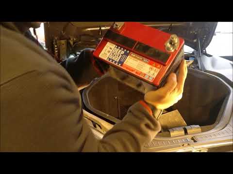 Видео: Tesla 2015: Замена 12в батареи