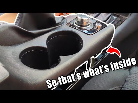 Видео: Mazda 3 | Снятие центральной консоли Axela