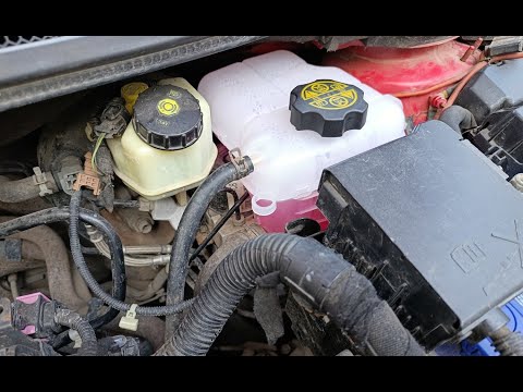 Видео: Расширительный бачок Опель Астра J
