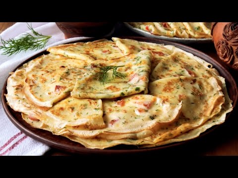 Видео: Тонкие блины с помидорами, зеленью и сыром
