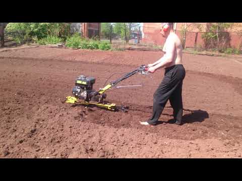 Видео: 30 мая 2018 г.Хютер GMC-9.0 Фрезеровка огорода.