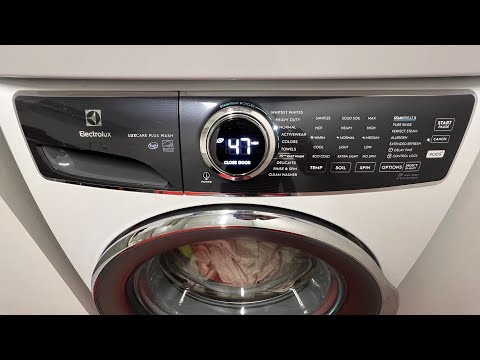 Видео: Дверца стиральной машины Electrolux не открывается.