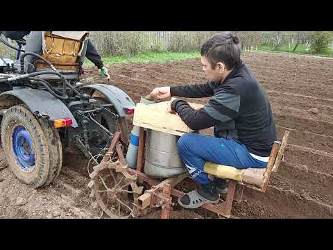 Видео: Картофелесажалка для минитрактора