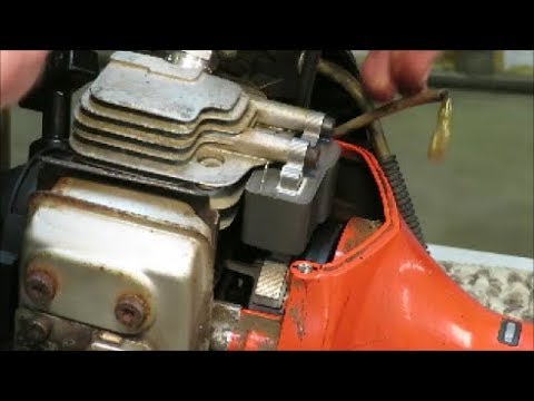 Видео: Проверка и замена катушки триммера для удаления сорняков