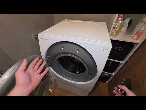 Видео: Стирально-сушильная машна LG с компрессором не закрыватся дверь. Впихнули невпихуемое...
