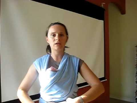 Видео: Кормление в горизонтальном положении в слинге шарфе.