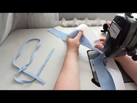 Видео: Как сшить мужские брюки. Ч. 4. Как пришить пояс. Как подшить низ брюк.