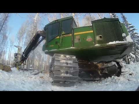 Видео: ✅Валочно-пакетирующий машин John Deere 853J 🌲🌲