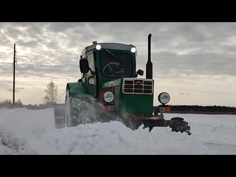 Видео: Т-40АМ обзор чистки снега.