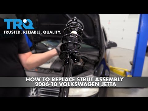 Видео: Как установить стойку в сборе на Volkswagen Jetta 2006-2010