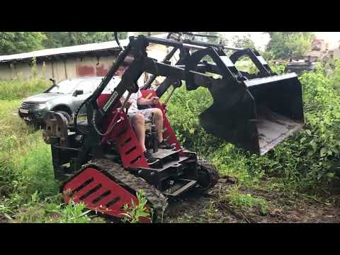 Видео: Двигаем заросший техногенный грунт погрузчиком Landformer КУБ 300