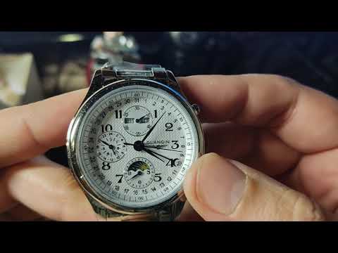 Видео: Распаковка механических наручных часов Guanqin GJ16011-8
