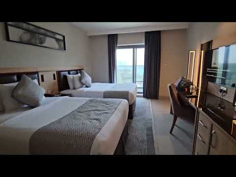 Видео: HOTEL Holiday International Sharjah 4*ОБЗОР НОМЕРОВ СТАНДАРТ С ВИДОМ НА ЛАГУНУ И НА ГОРОД