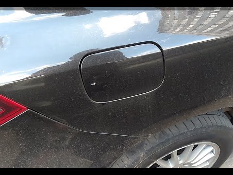 Видео: Ремонт замка кришки бака РеноЛагуна 3