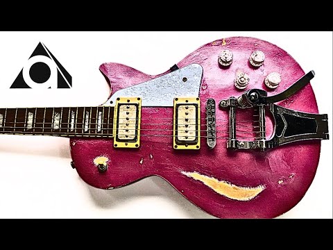 Видео: Я перекрасил гитару с нарисованной на ней загадочной фигурой.