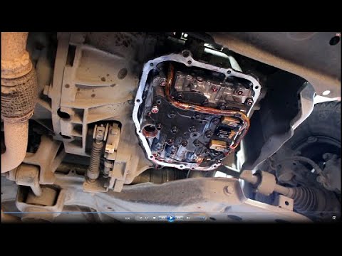 Видео: Замена масла и масляного фильтра в АКПП на Toyota Passo 1,0 Тойота Пассо 2009 года