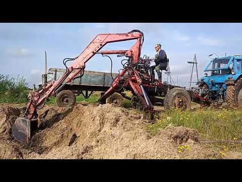 Видео: Грейферный погрузчик прицепной. пэф 1бм экскаватор на МТЗ