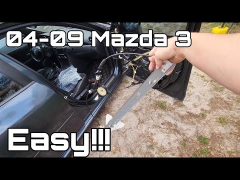 Видео: Как заменить стеклоподъемник на Mazda 3!