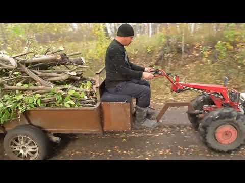 Видео: Чистим новый участок от деревьев.Мотоблок МТЗ на шинах ГРУБЕРГ с возом веток по бездорожью.