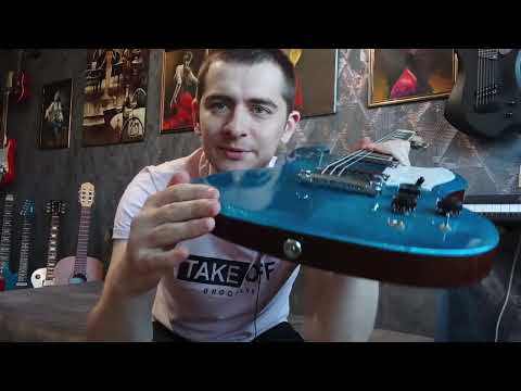 Видео: Обзор мастеровой электрогитары MG 55