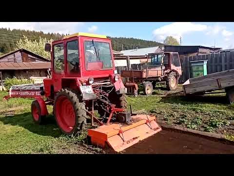 Видео: Т-25 с почвофрезой