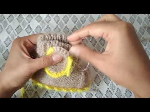 Видео: Пинетки спицами собачки часть2 Завершение