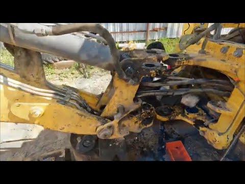 Видео: Заменили 22 втулки за день.New holland b90b