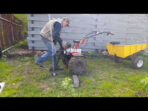 Видео: Домкрат пит-стоп для мотоблока в деле.