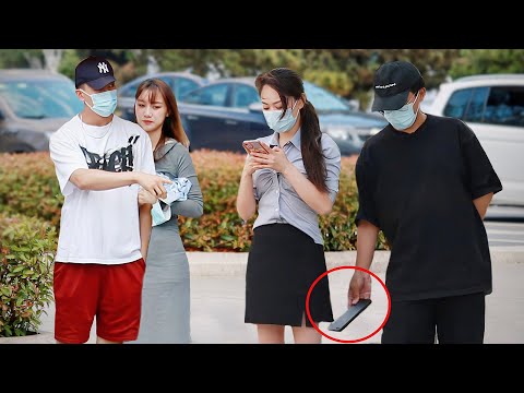 Видео: Когда парень тайком фотографирует у девушки под юбкой, как поступят прохожие?
