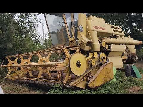 Видео: Огляд комбайна Ньюхоланд.Цяцька діда Василя.