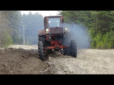 Видео: Первая борозда на нашем Т-40 АМ ,пробный выезд.