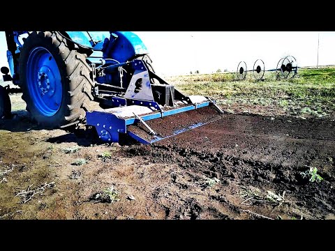 Видео: Трактор т 40, установка и регулировка фрезы по высоте, замер глубины пахоты