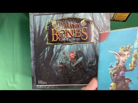 Видео: TOO MANY BONES [1] - распаковка роскошной настольной игры "Слишком много костей"