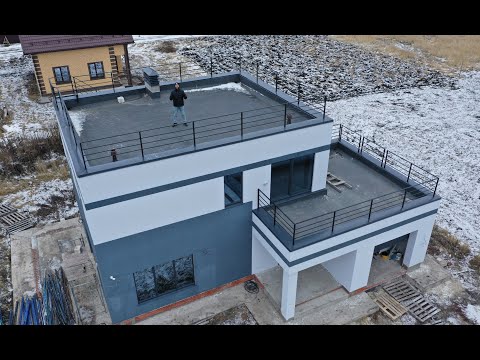 Видео: Дом в стиле хайтек с плоской эксплуатируемой кровлей