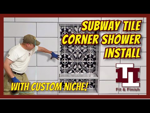 Видео: Отделка угловой душевой кабины плиткой Subway