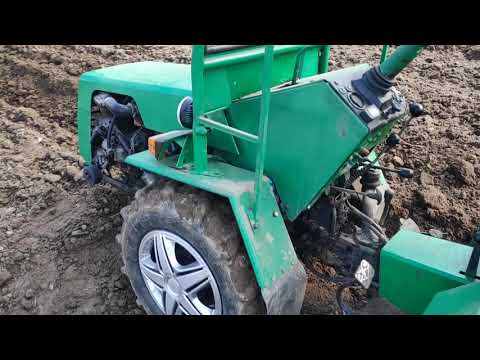 Видео: пахота двухкорпусным плугом МТЗ 082-132 н