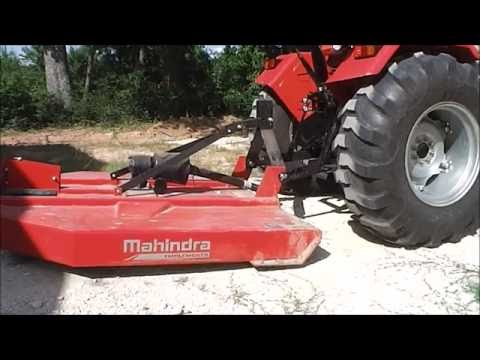 Видео: Как присоединить косилку к трактору