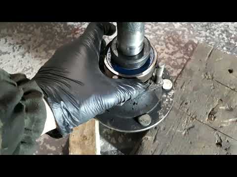 Видео: Замена подшипника полуоси