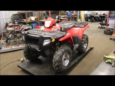 Видео: Как заменить масло на Polaris Sportsman 500