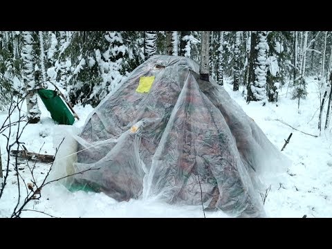 Видео: Обогрев палатки зимой--Последние секреты тёплой палатки