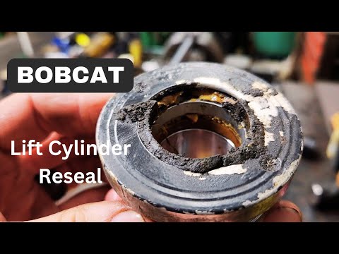 Видео: Повторное уплотнение подъемного цилиндра BOBCAT