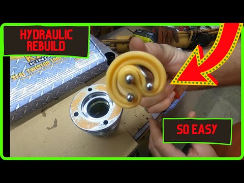 Видео: Экскаватор-погрузчик Case 580 K — как восстановить гидроцилиндр с помощью инструмента Seal Twister