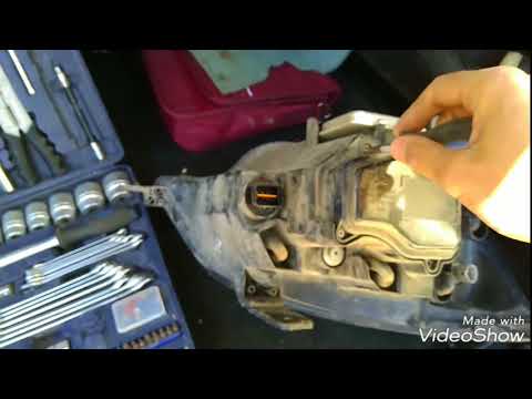 Видео: Замена ламп ксенон Opel Antara