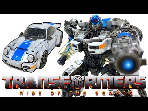 Видео: Обзор серии Transformers Studio 105 «Возникновение зверей» Deluxe Class MIRAGE